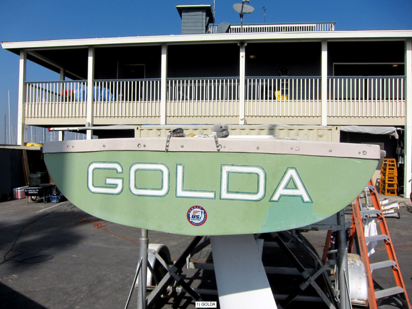 A boat is parked in front of the dock.