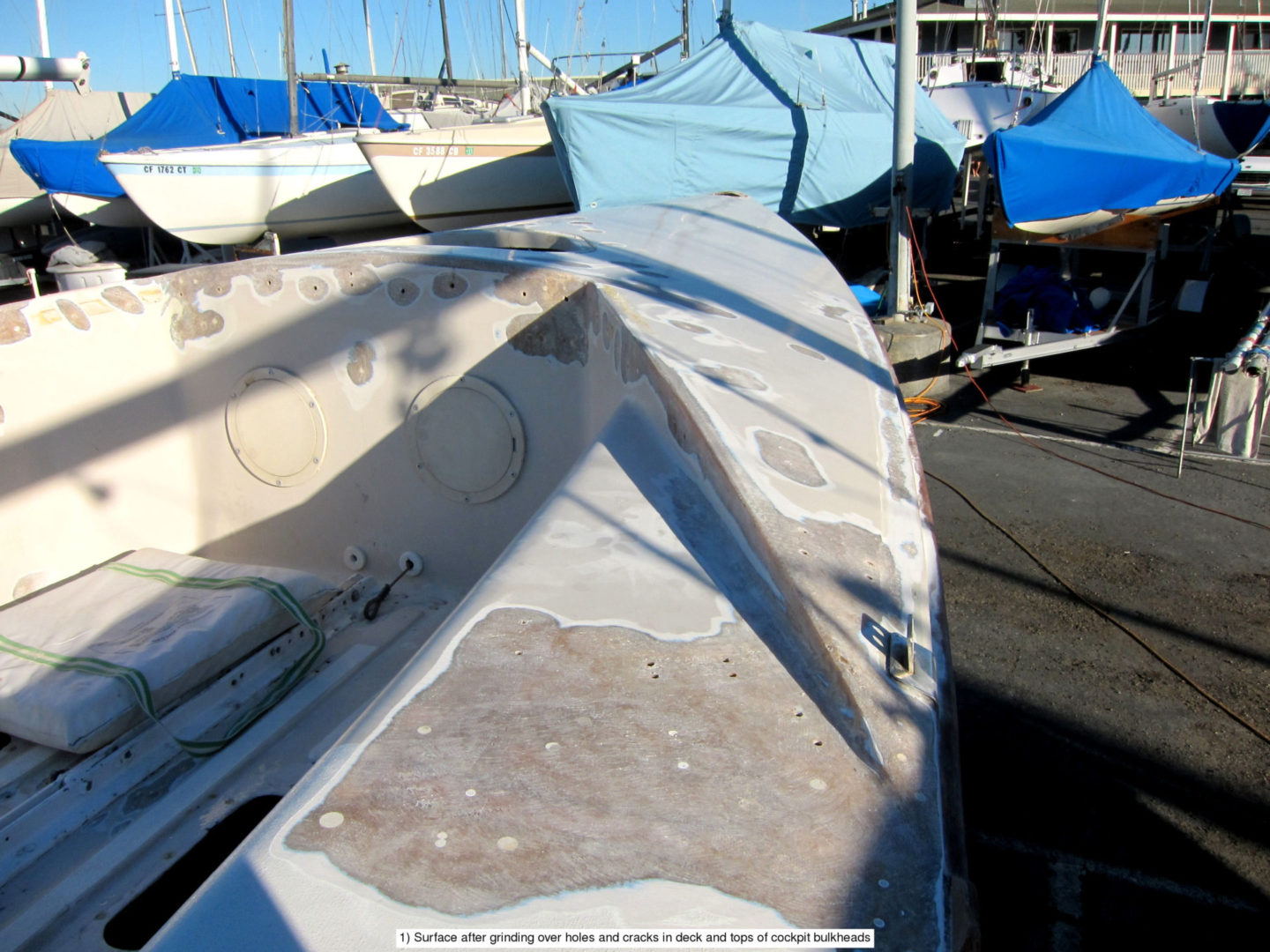 A boat is sitting in the water at dock.