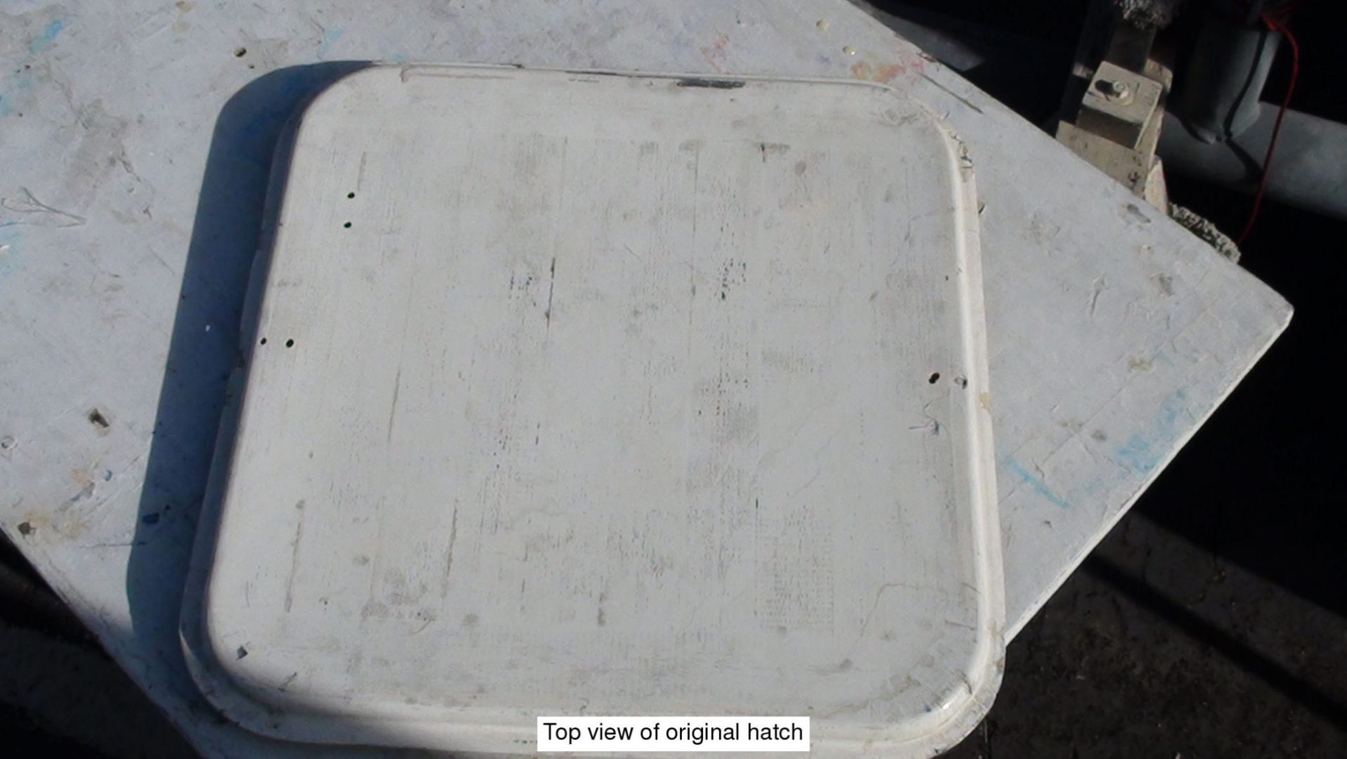 A white square plate sitting on top of a table.