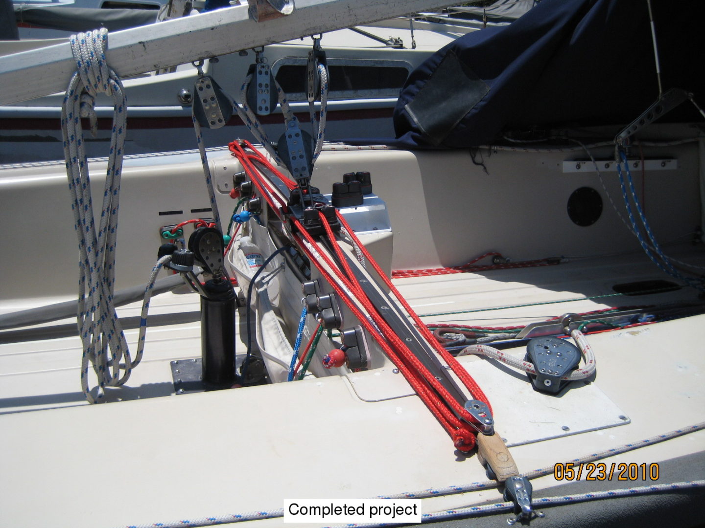 A boat with some red and white poles on it