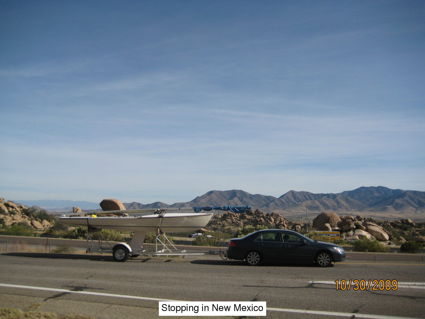 A car is parked on the side of the road.