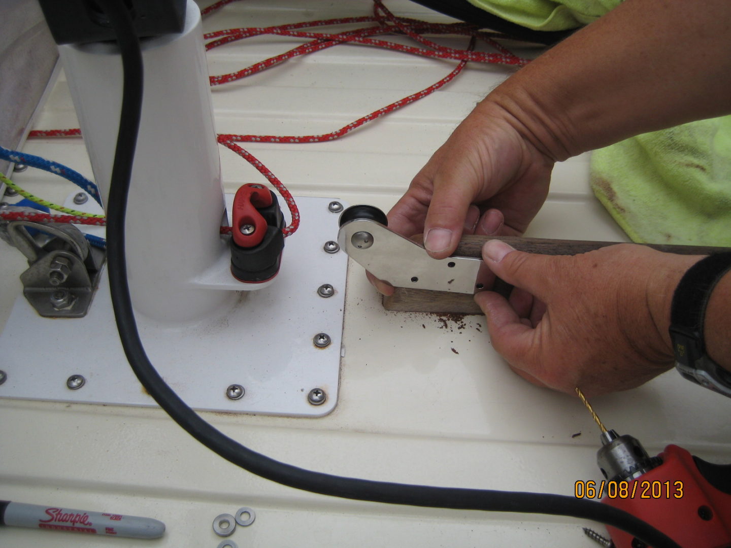 A person working on an electrical device.