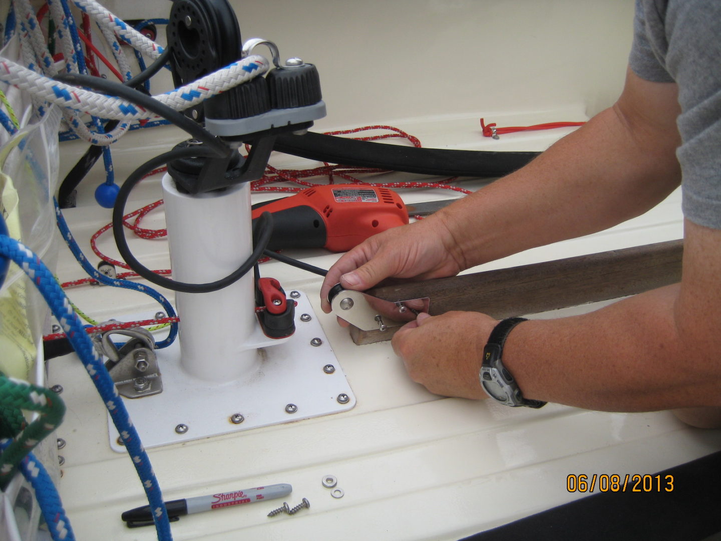 A person working on a piece of equipment.