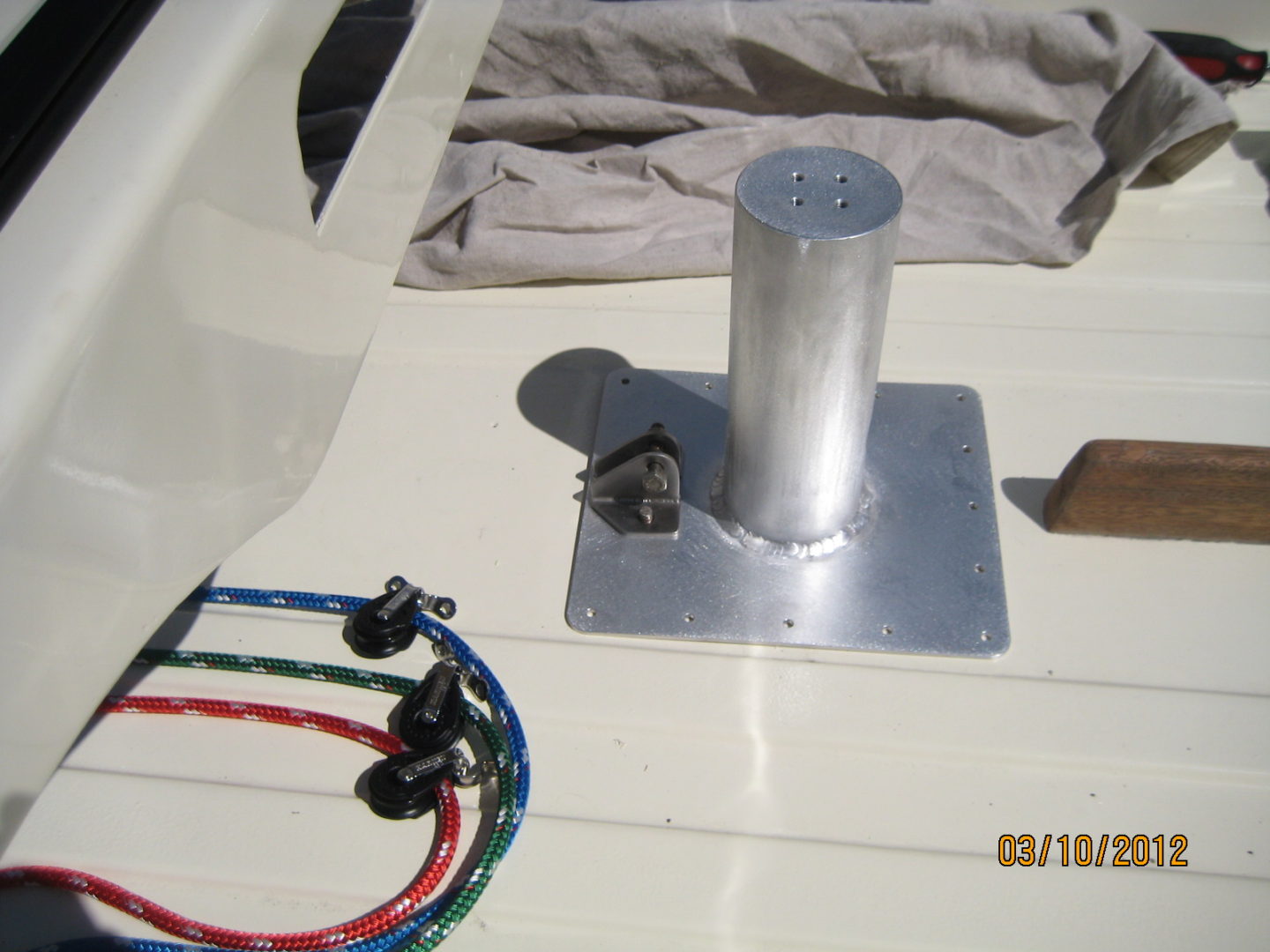 A metal pole sitting on top of a boat.