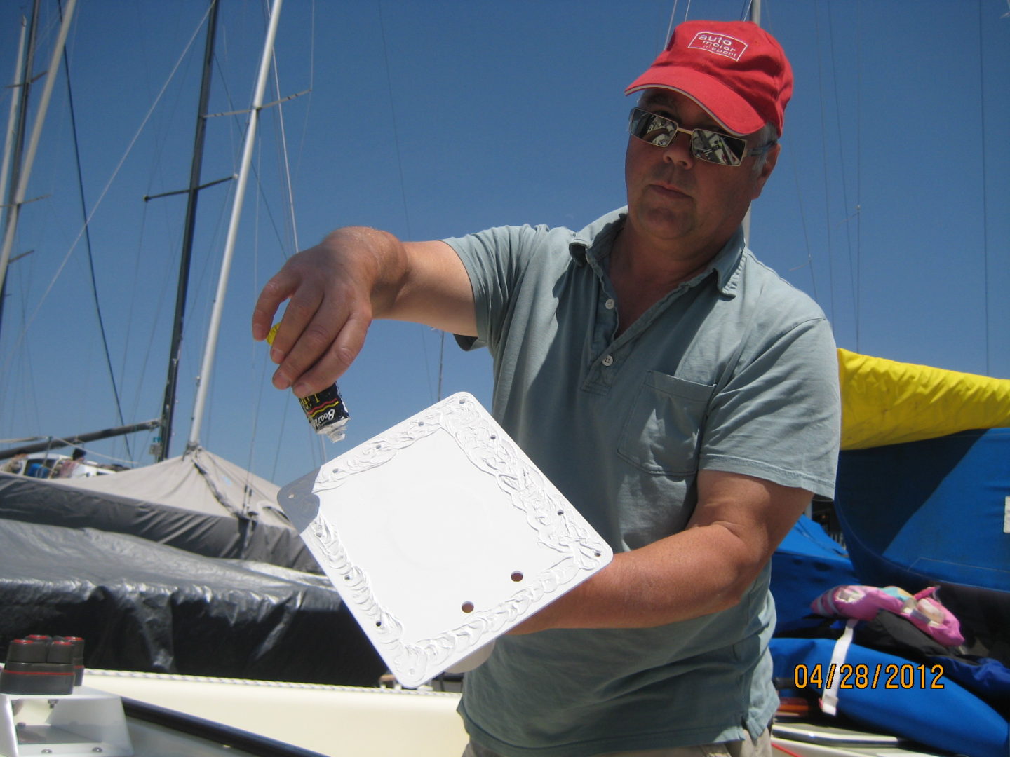 A man holding onto a piece of paper