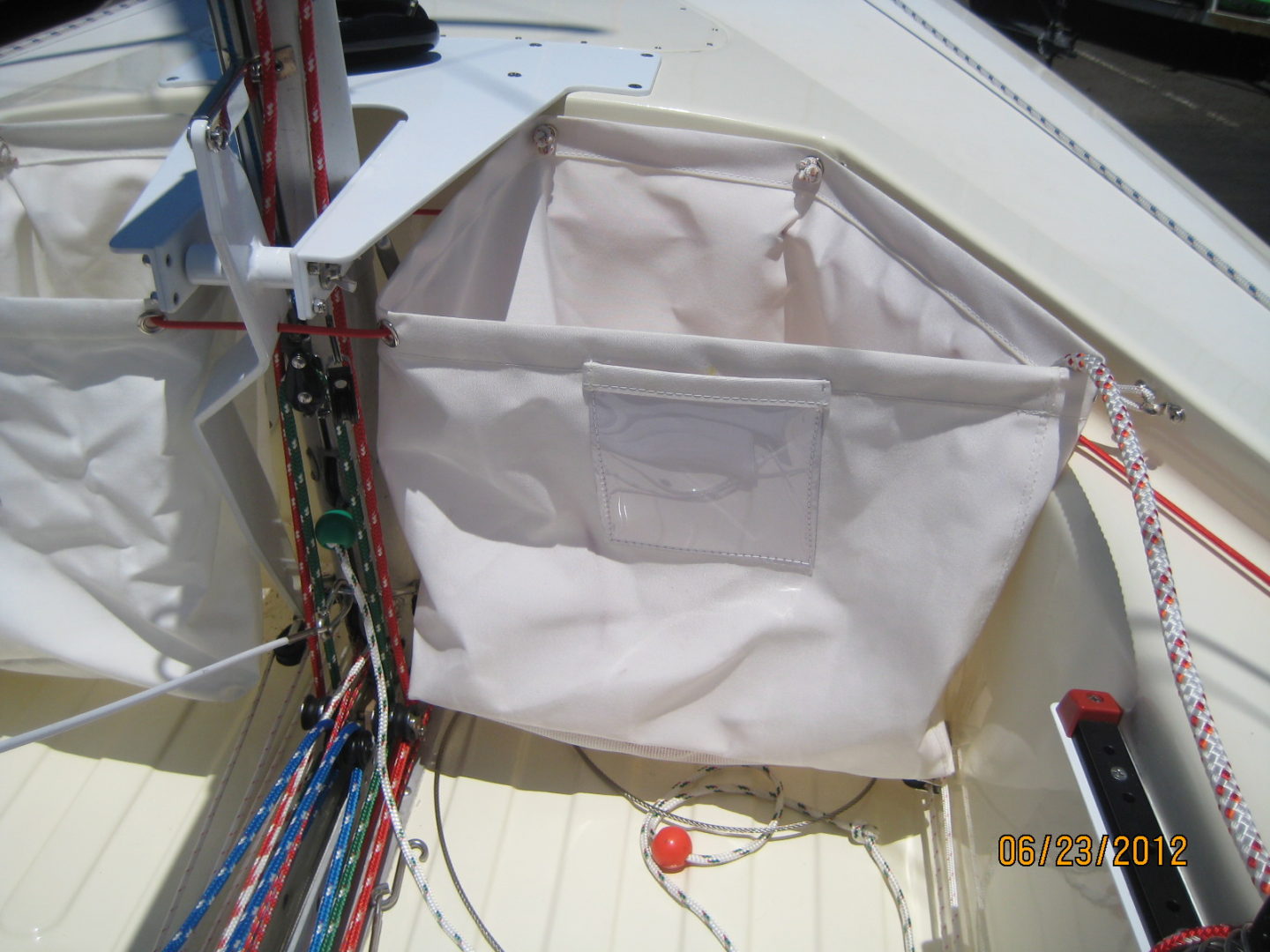 A white bag sitting on top of a boat.