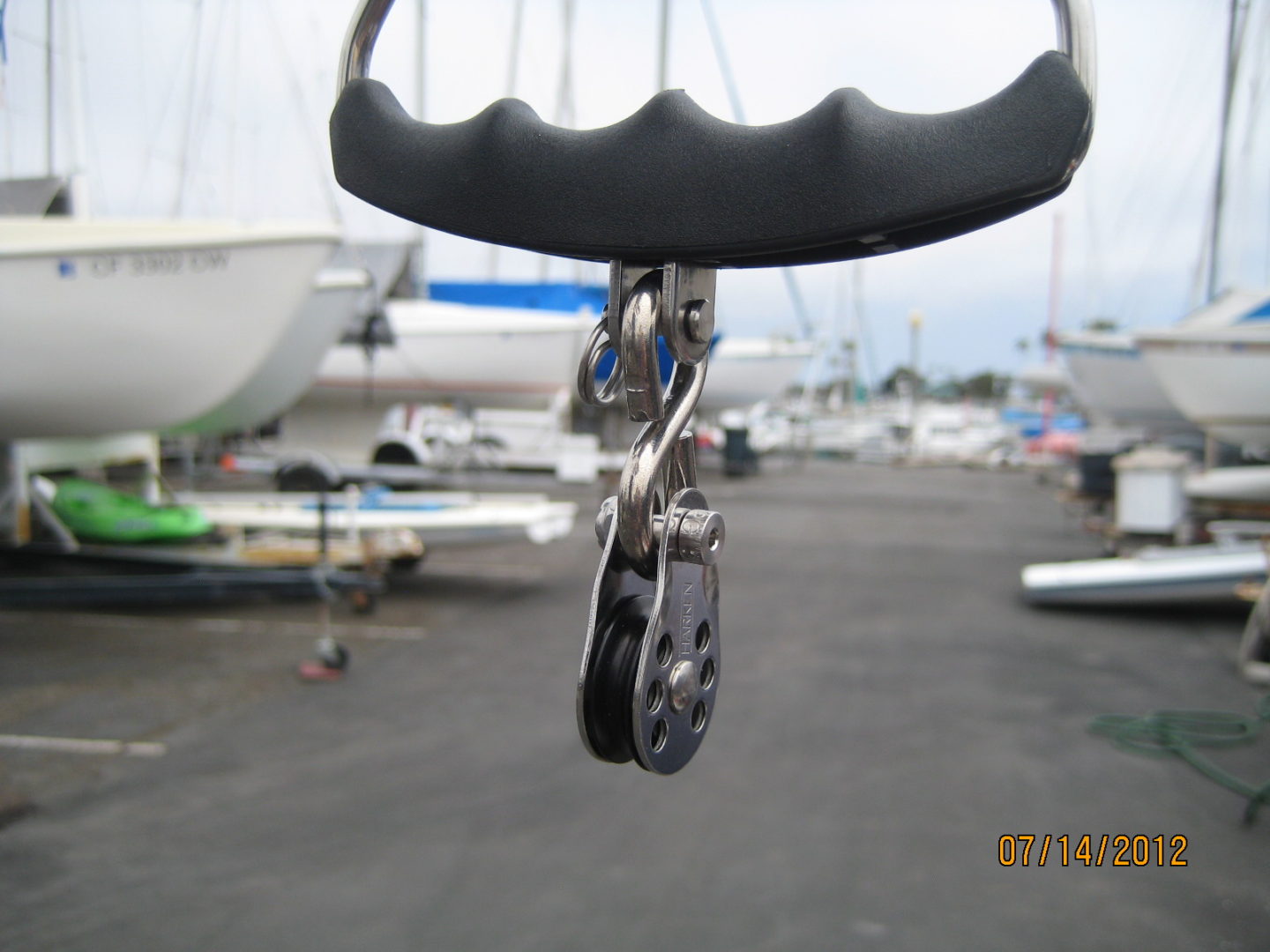 A close up of the pulley on a boat