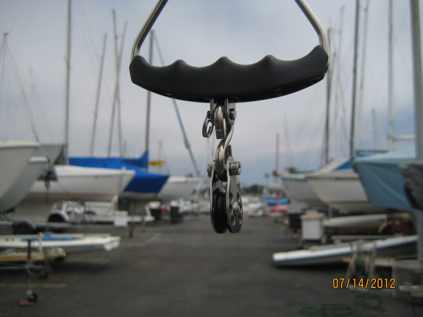 A chain hanging from the side of a boat.