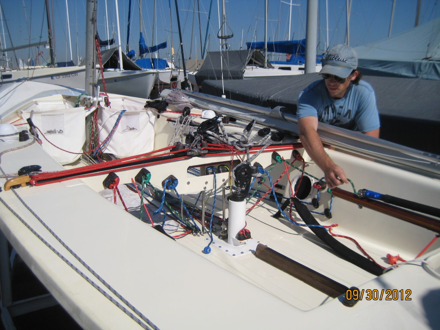 A man working on the deck of a boat.