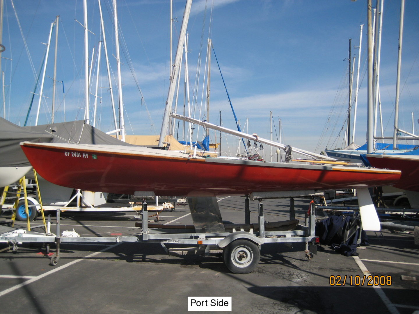 A boat is parked in the parking lot.