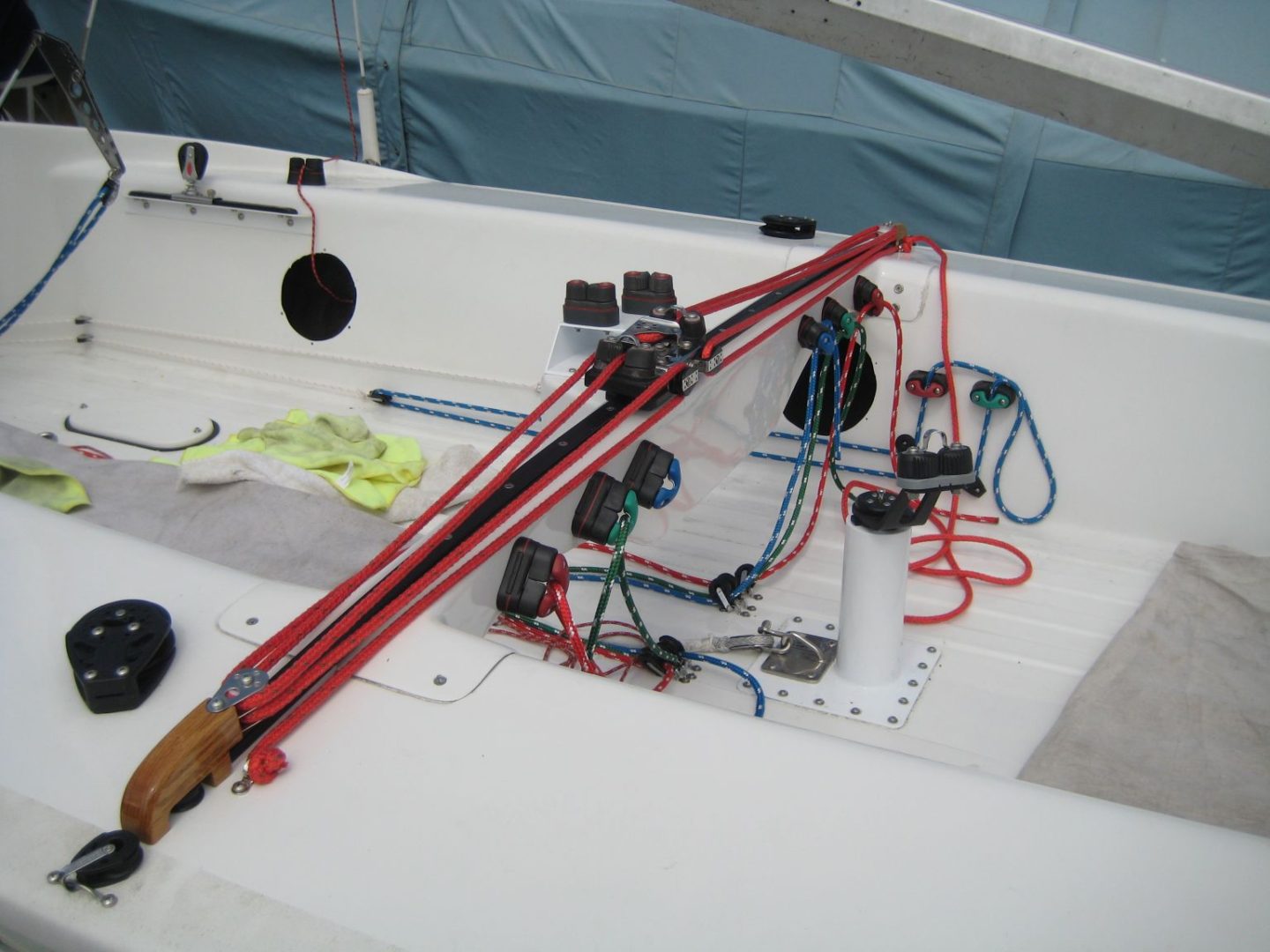 A boat with many wires and some red parts