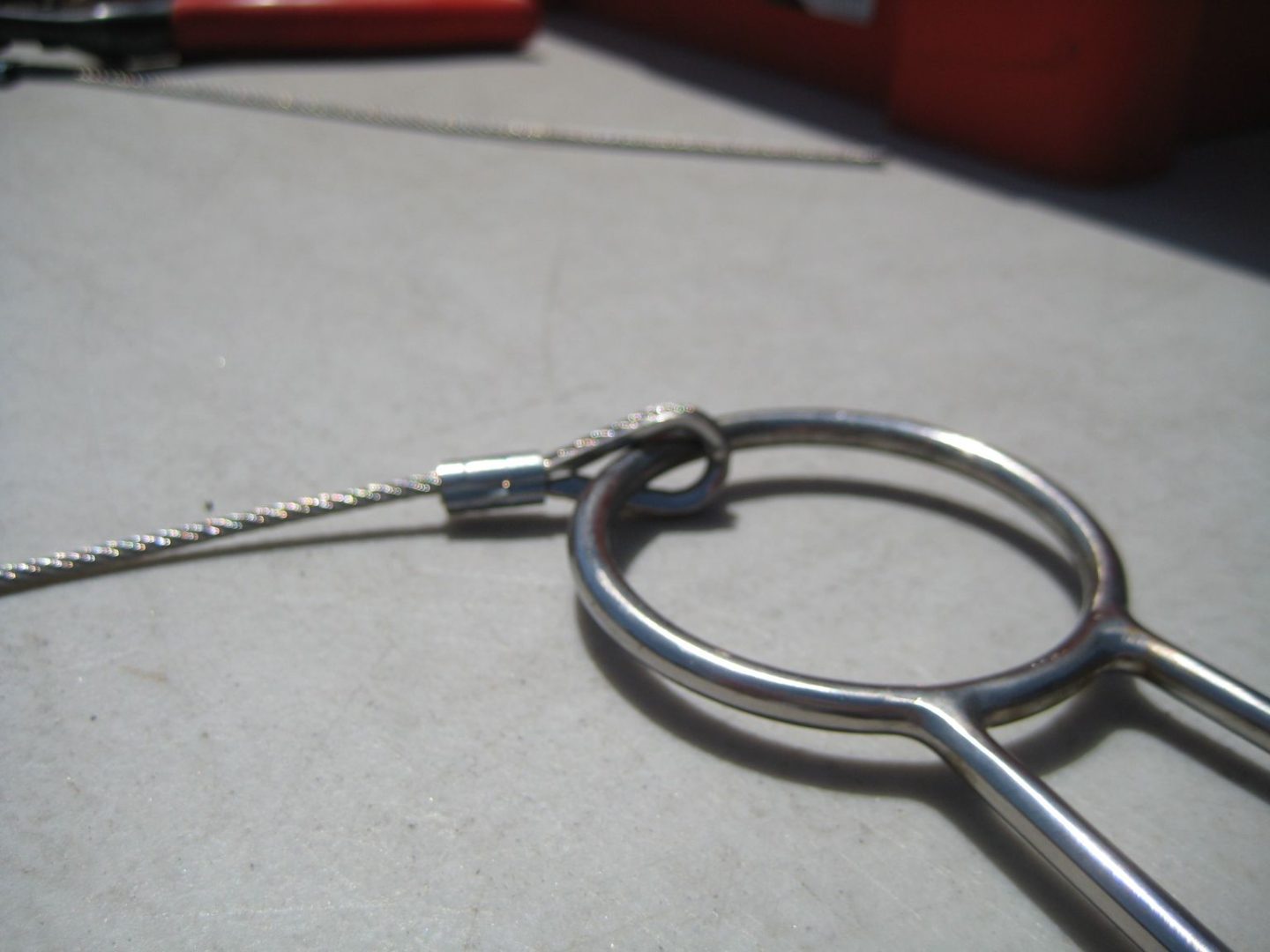 A pair of scissors sitting on top of a table.