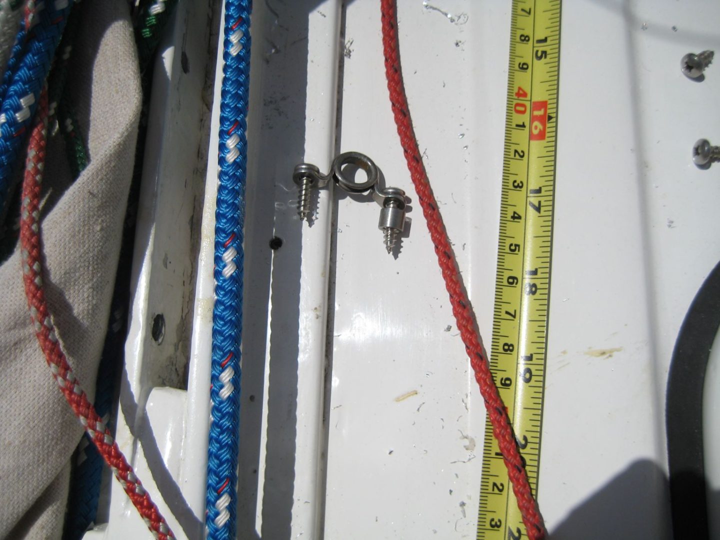 A close up of a pair of ropes and a measuring tape