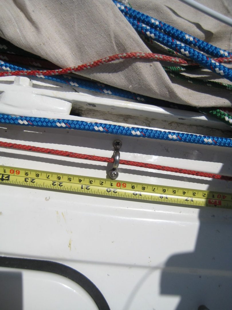 A close up of a ruler and some ropes