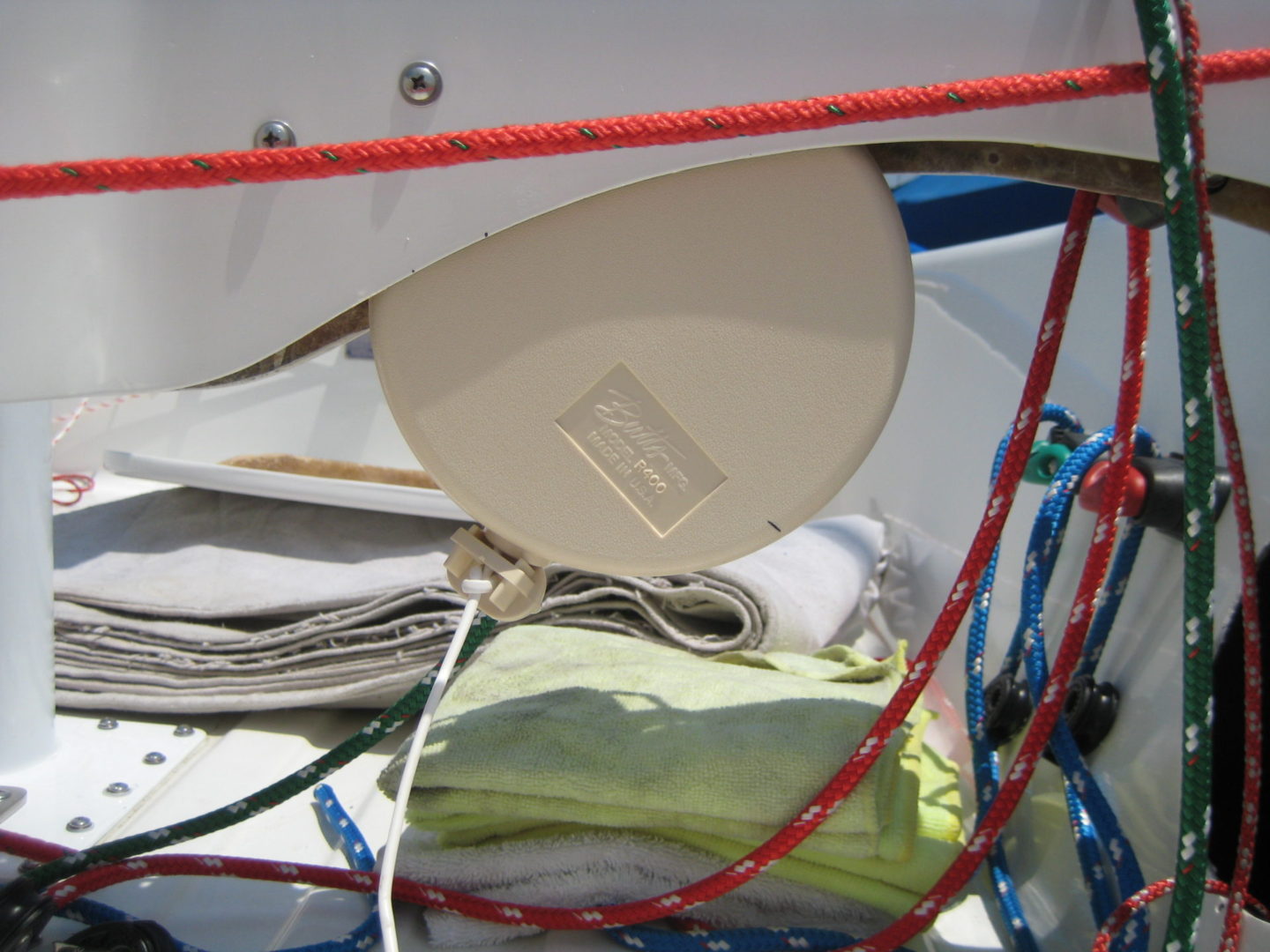 A close up of a computer mouse on top of some ropes