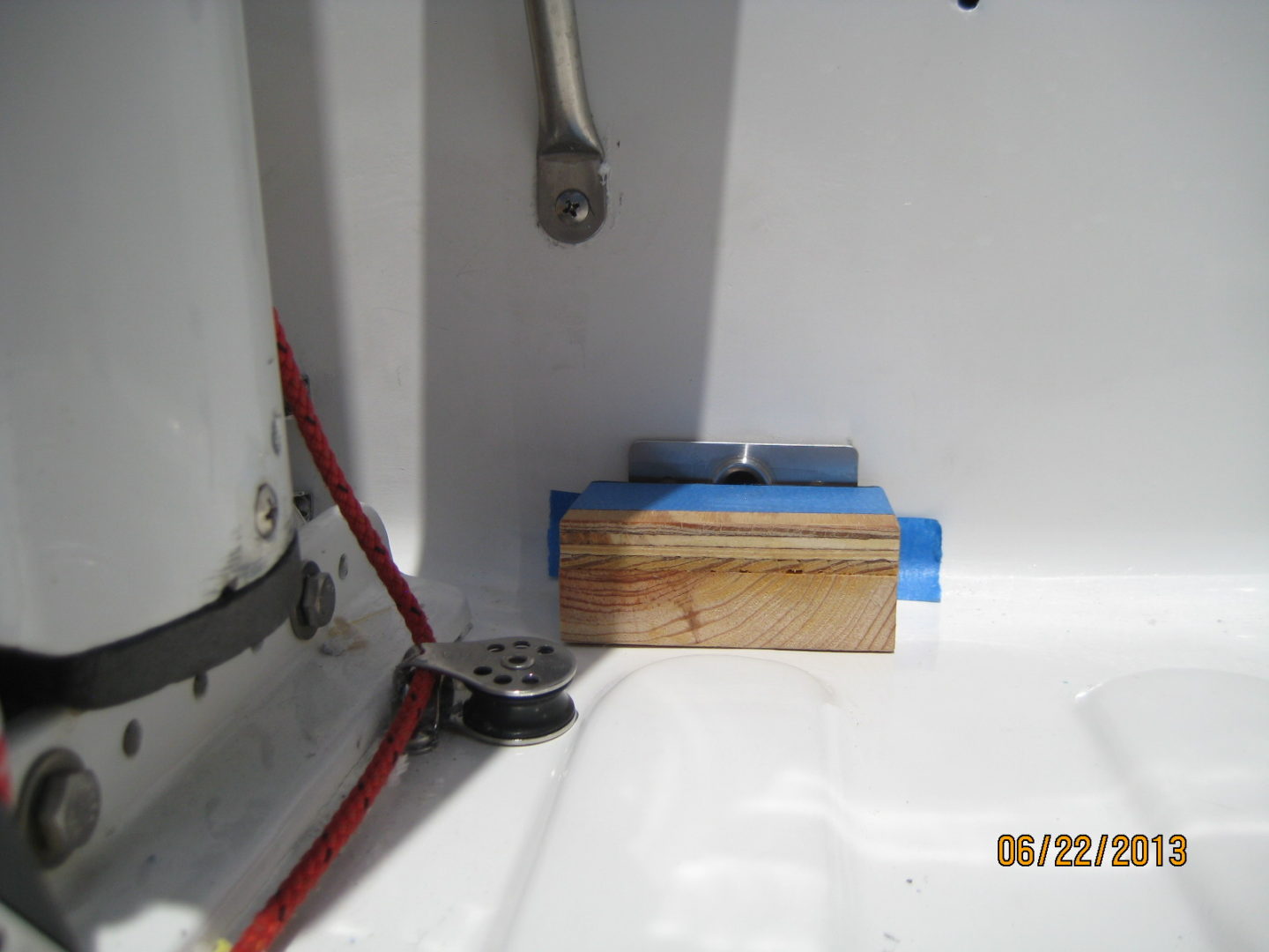 A wooden box sitting in the middle of a bathroom sink.