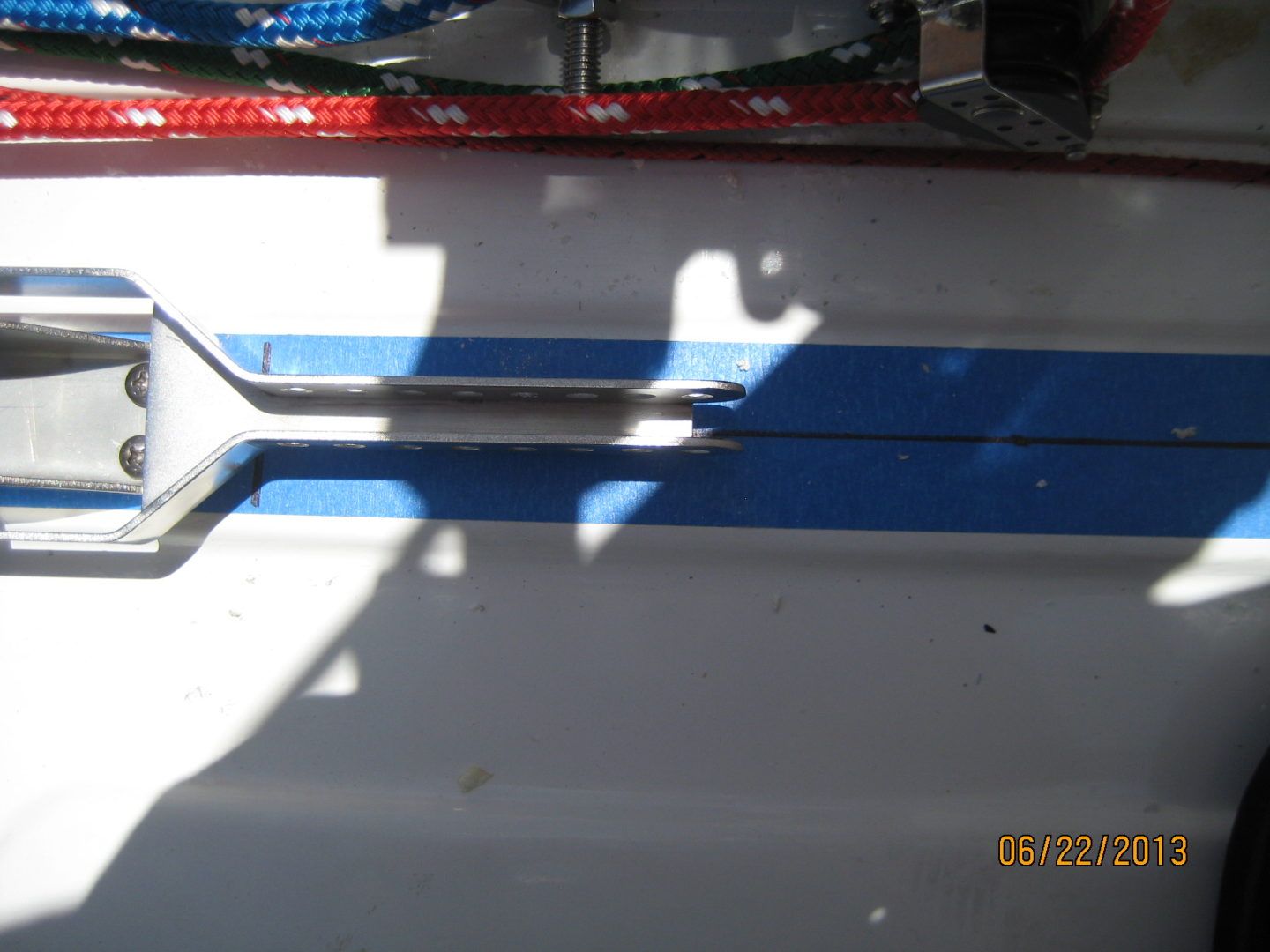 A close up of the shadow on a boat