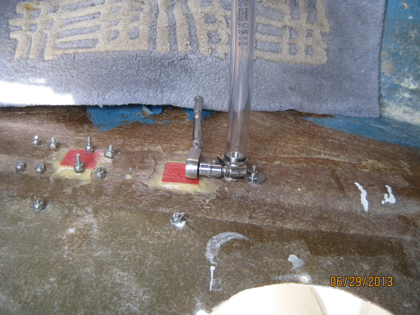 A close up of the floor with water leaking