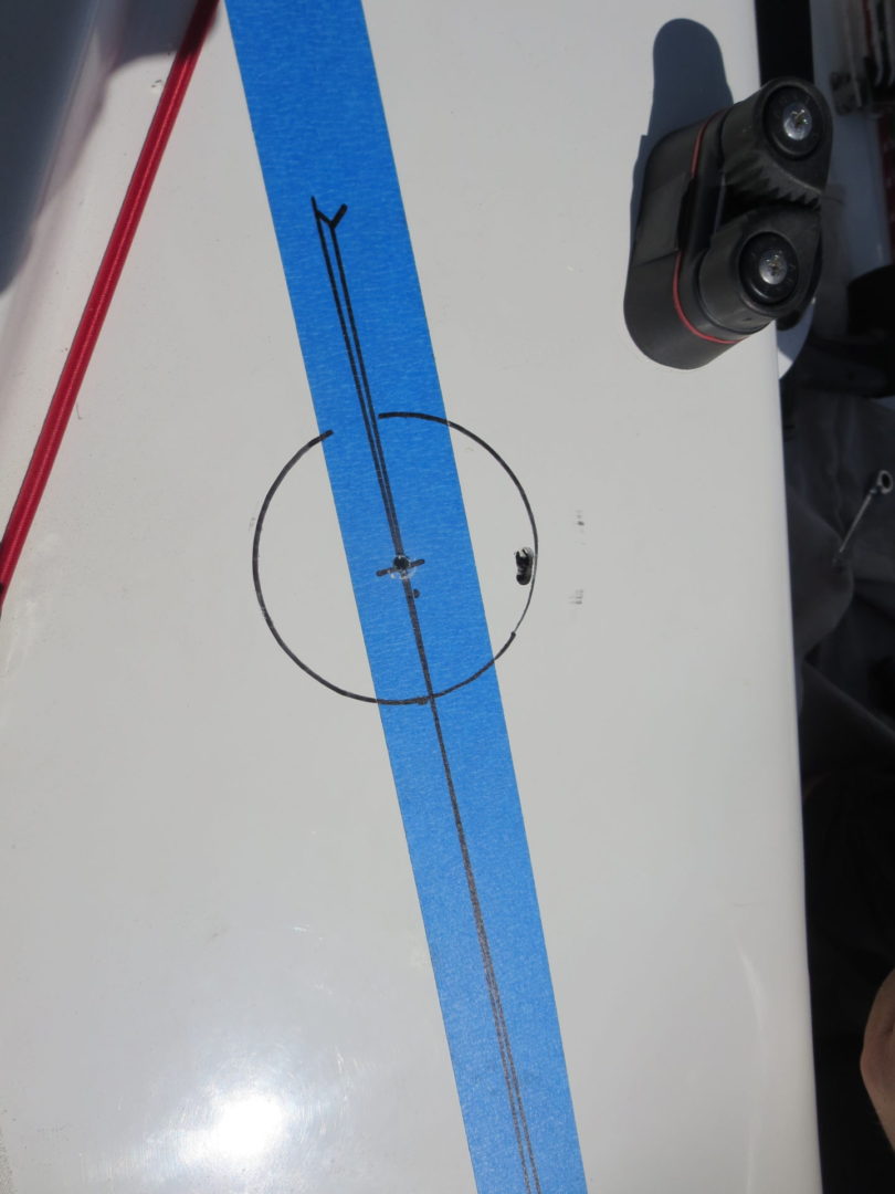 A blue line is drawn on the side of a plane.