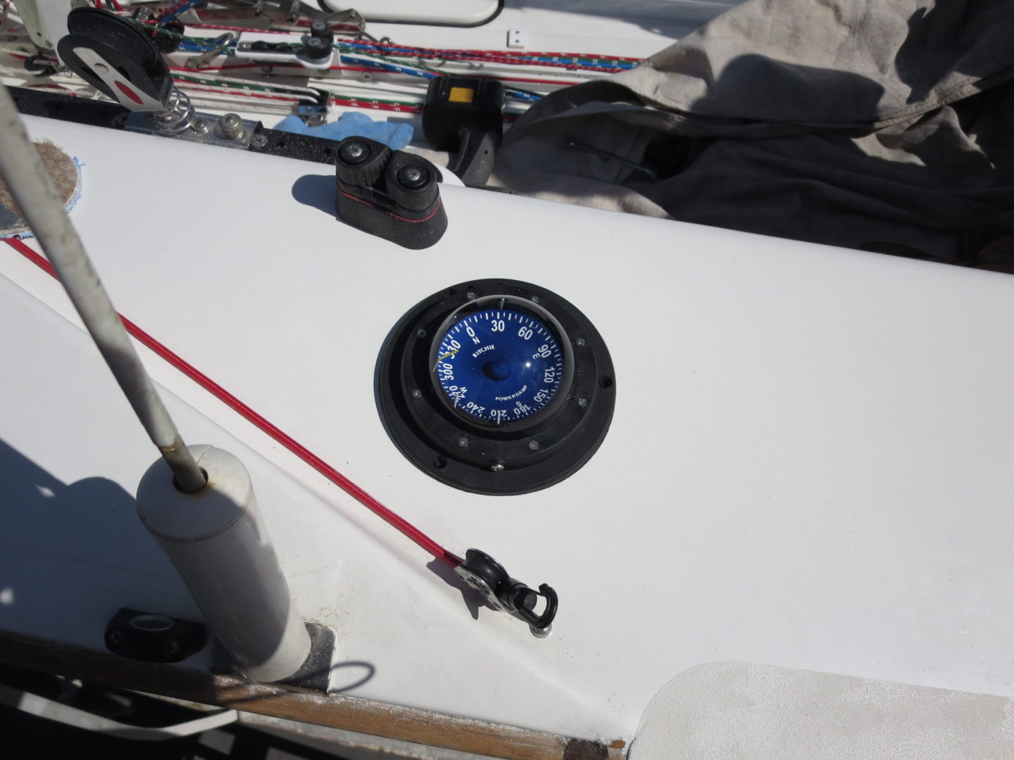 A clock on the side of a boat.