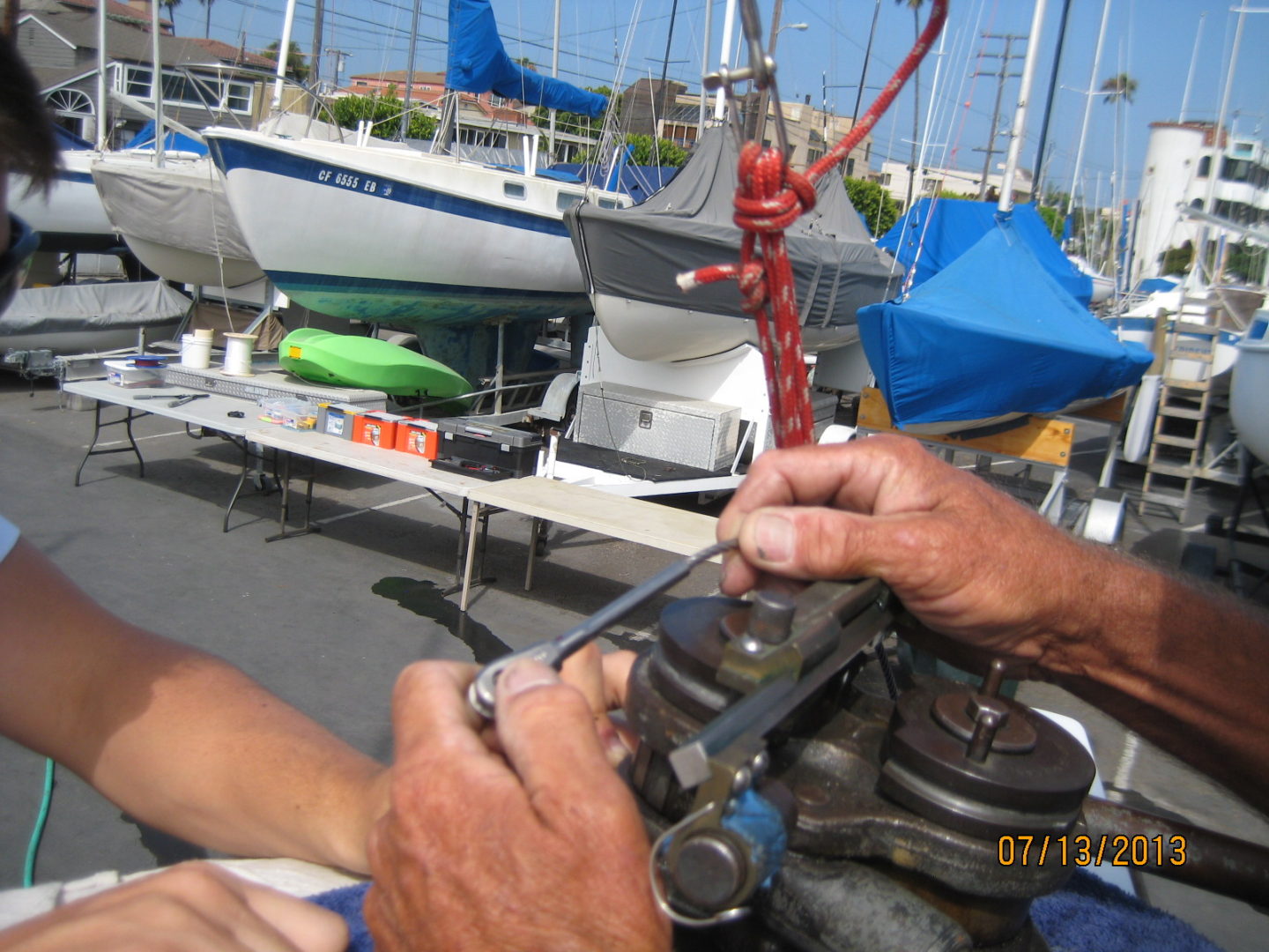 A person working on a boat in the water.