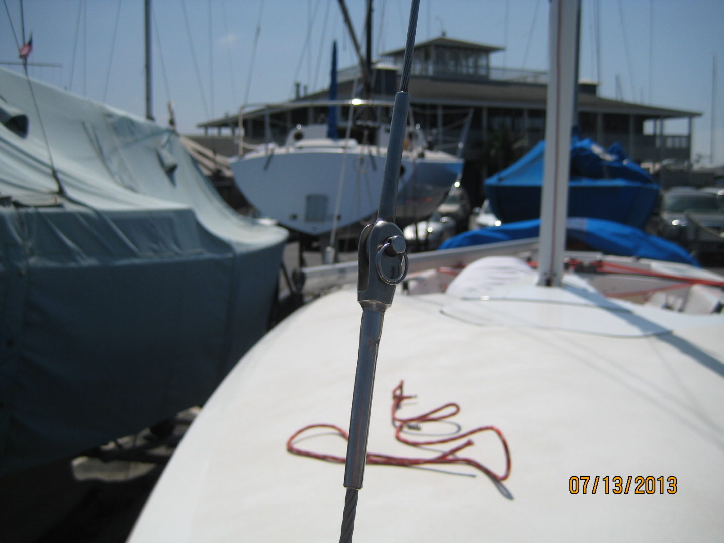 A boat is tied to the dock and ready for sailing.