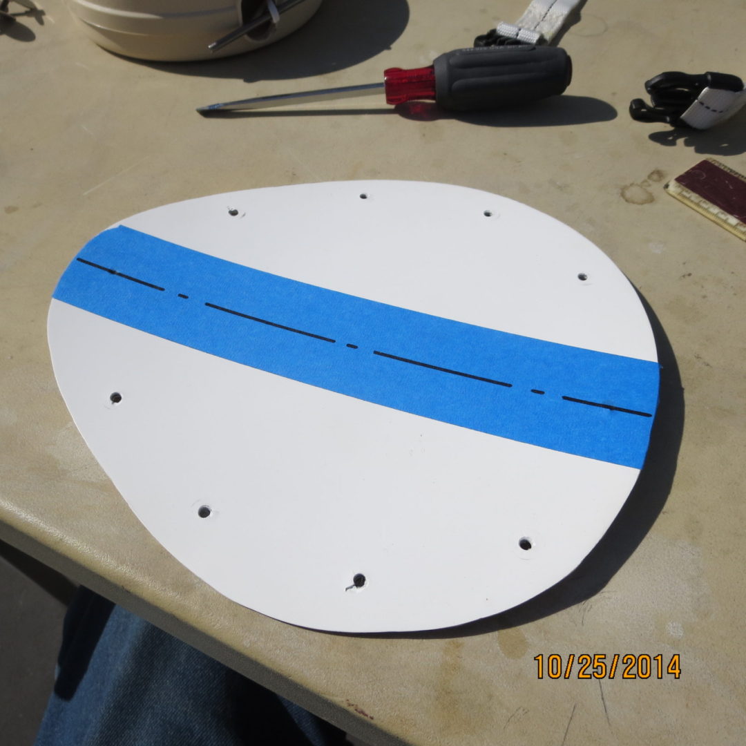 A white plate with blue stripes on top of it.