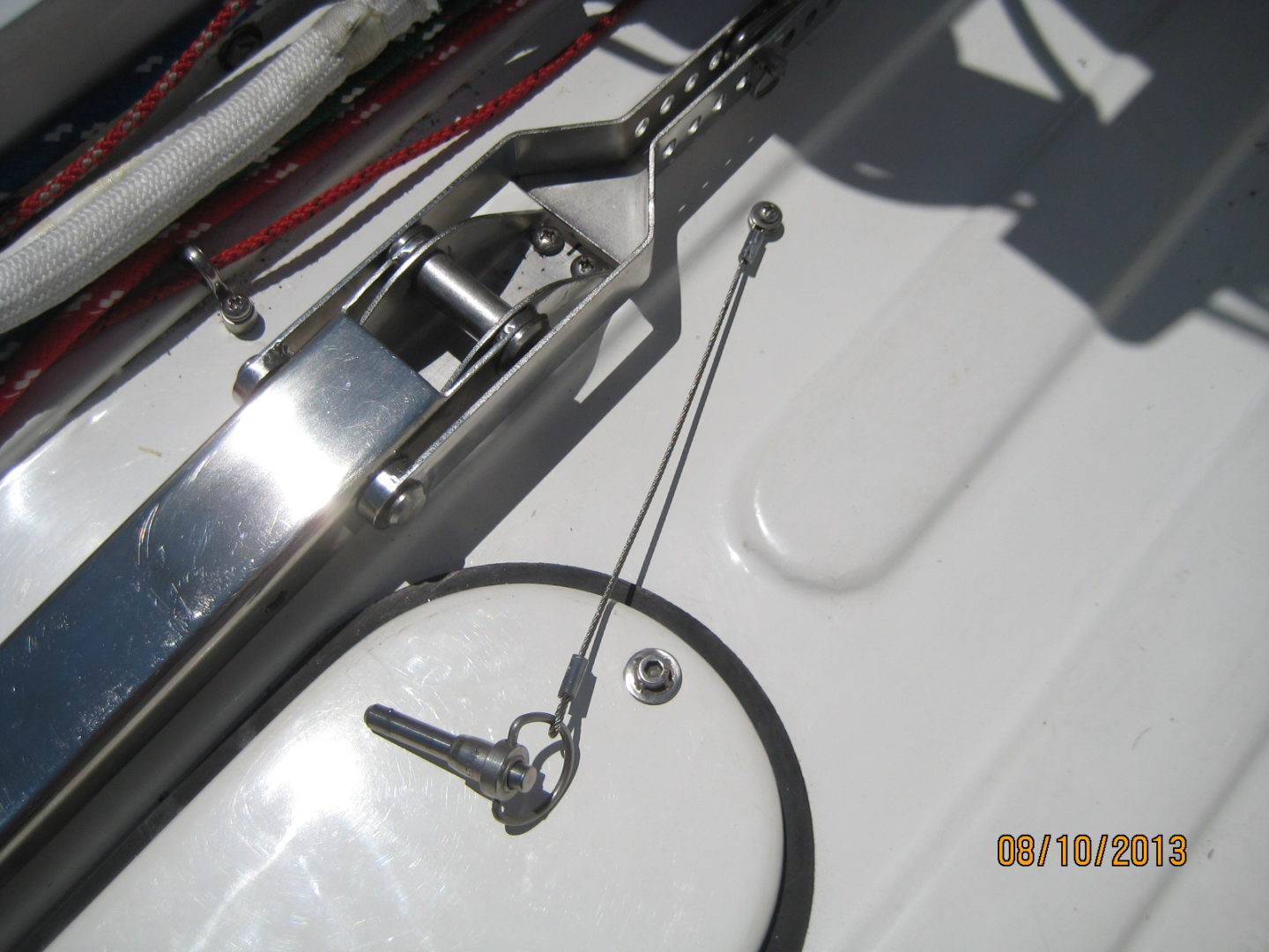 A close up of the steering wheel on a boat