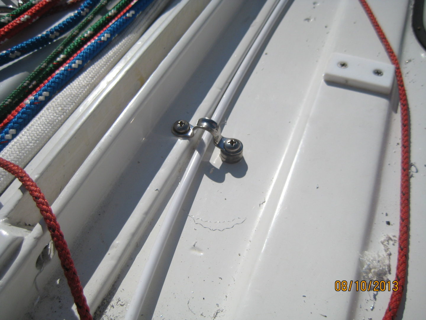 A close up of the side rails on a boat.