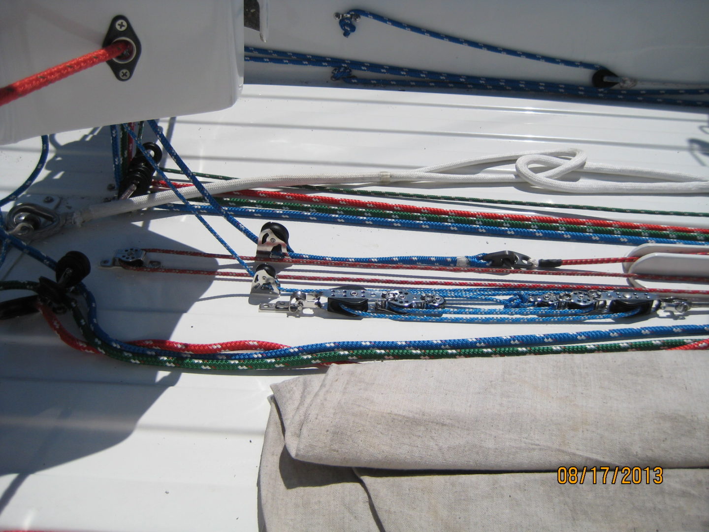 A boat with several ropes on it's deck.