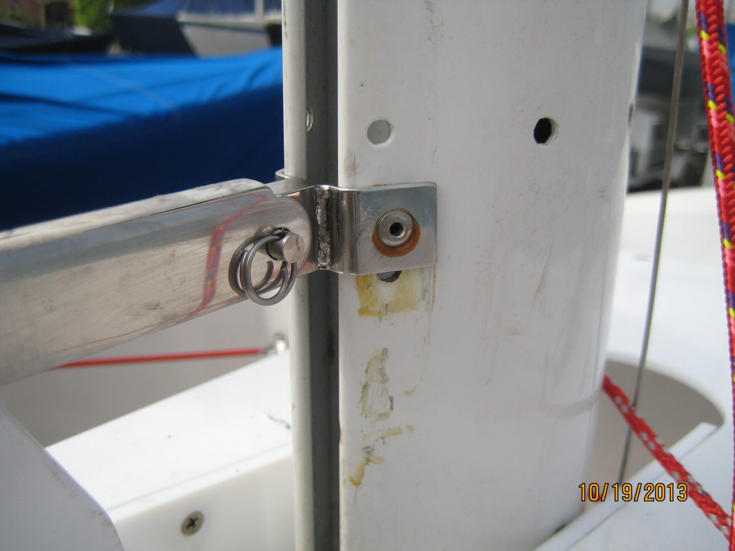 A close up of the door and lock on a boat.