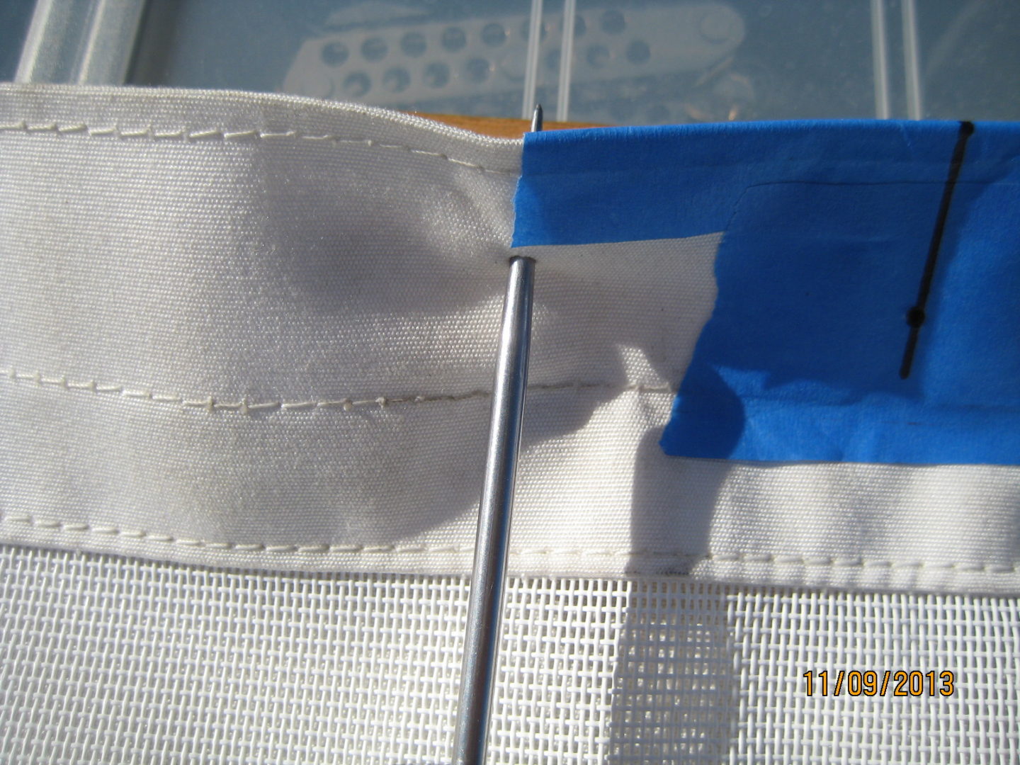 A close up of the flag on a white cloth