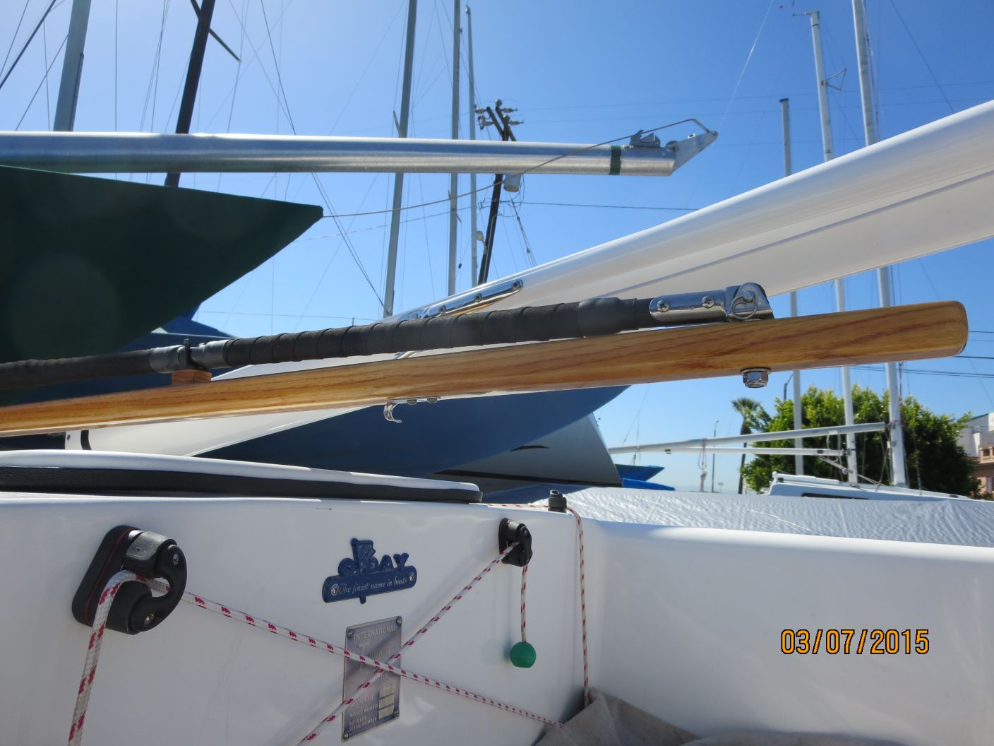 A boat is parked in the water on the dock.