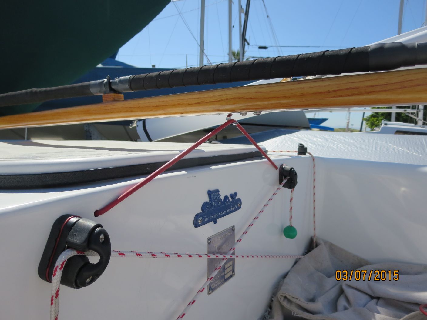 A boat with two ropes tied to the side of it.