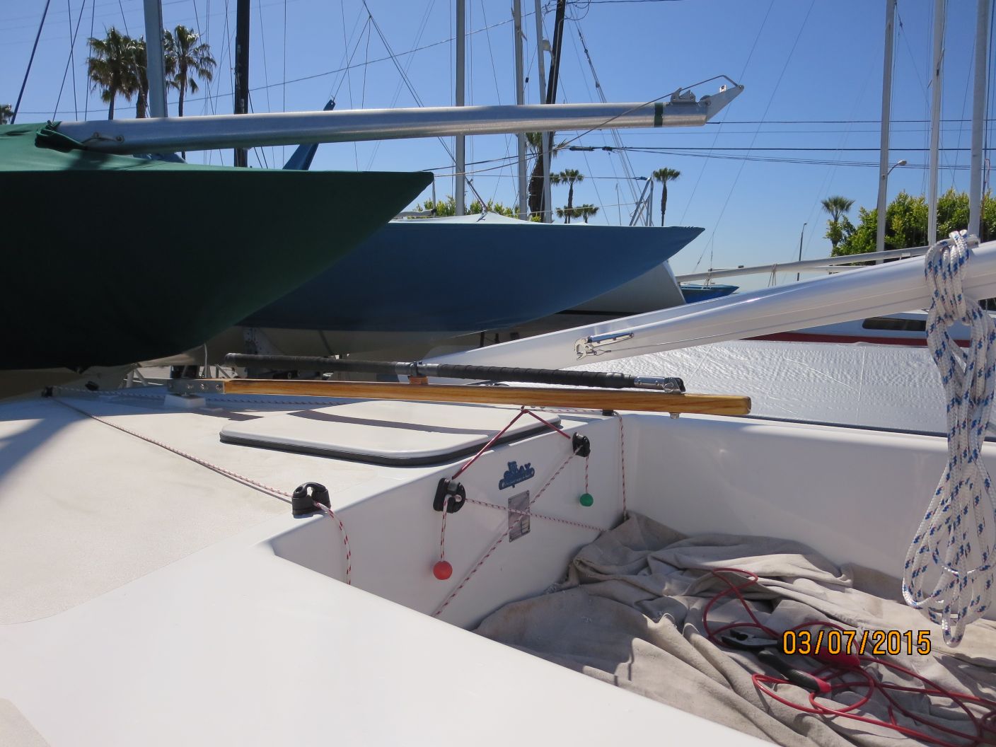 A boat is parked on the dock and has been painted.