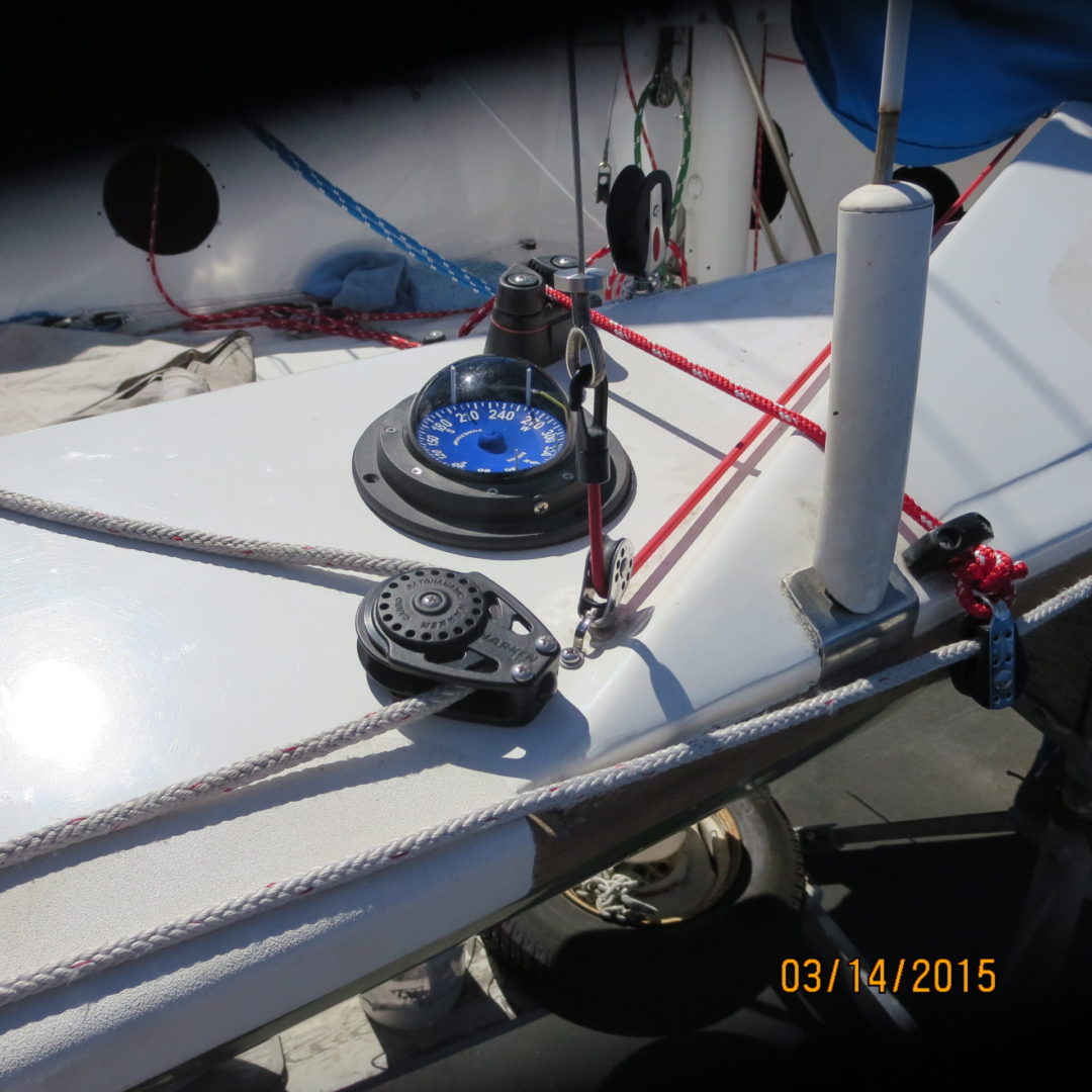 A boat with some wires and a blue light