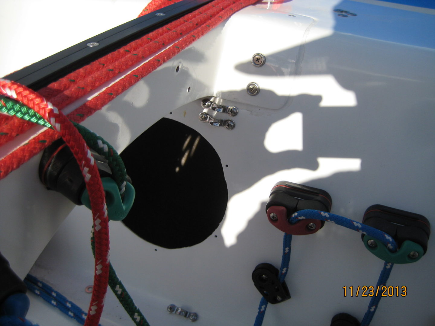 A close up of the hole in the side of a boat.