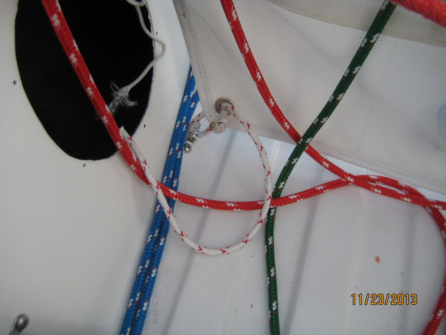 A close up of ropes on the side of a boat