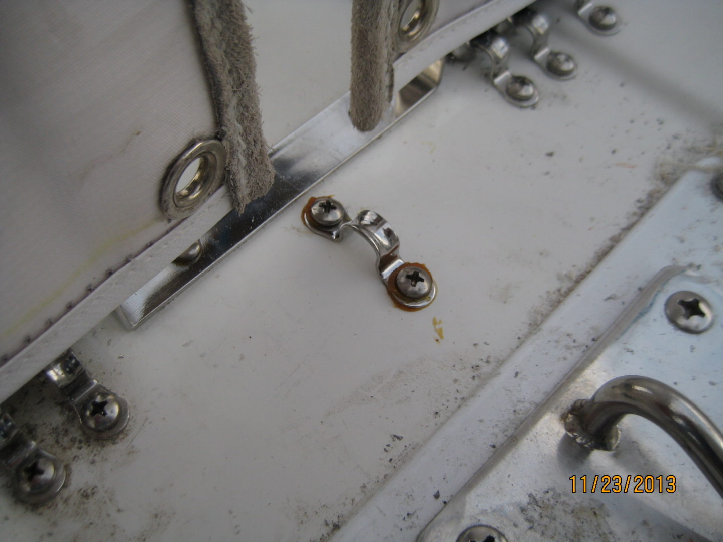 A close up of the metal parts on a boat.