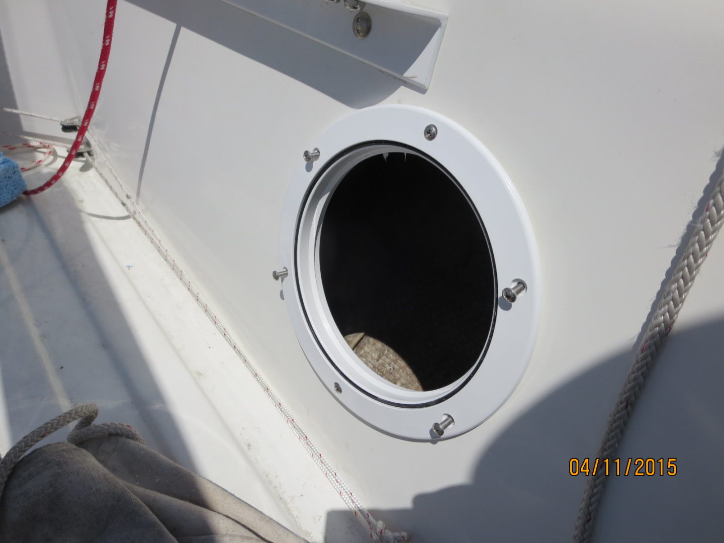 A close up of the porthole on a boat.