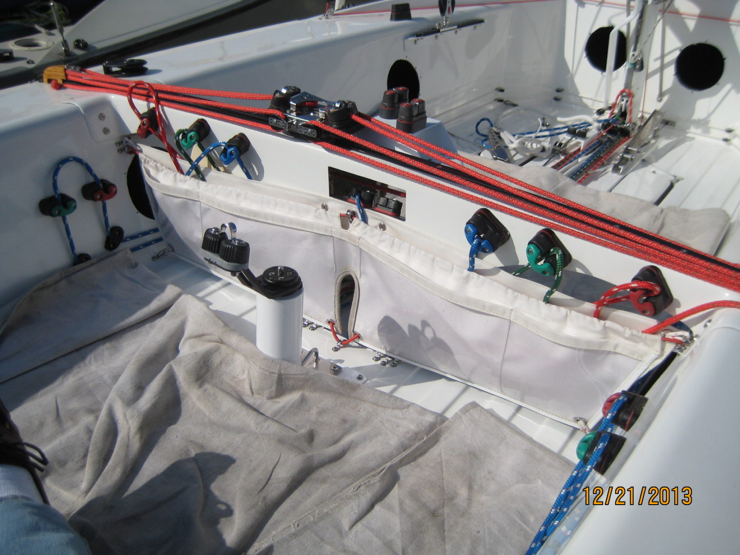 A boat with many ropes on it's deck.