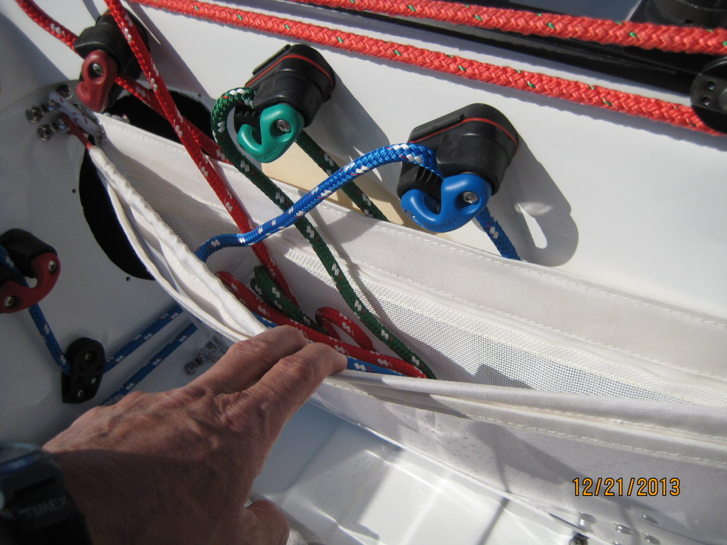 A person is pulling the rope from the boat.