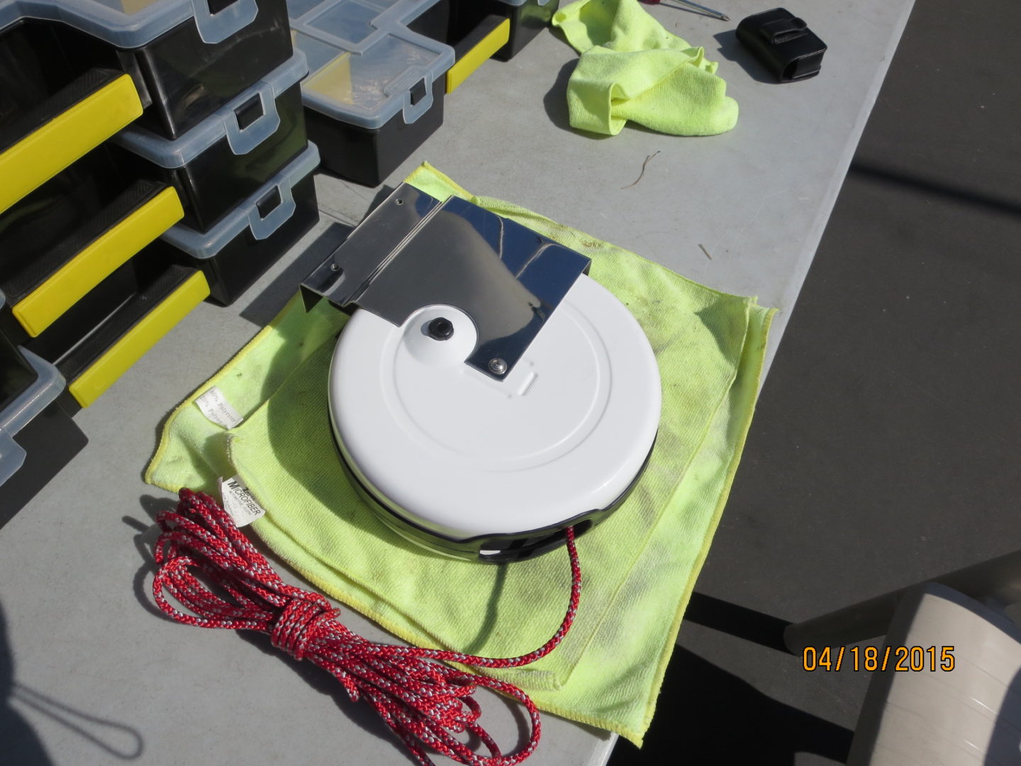 A solar powered device is sitting on top of a table.