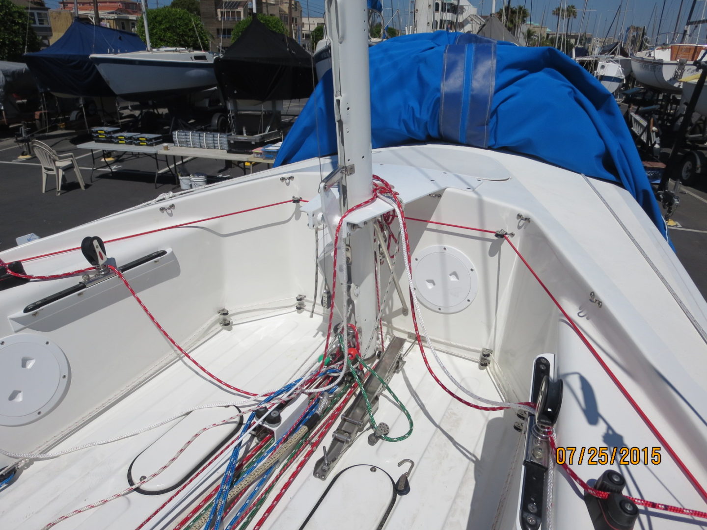 A boat with many wires on the side of it.