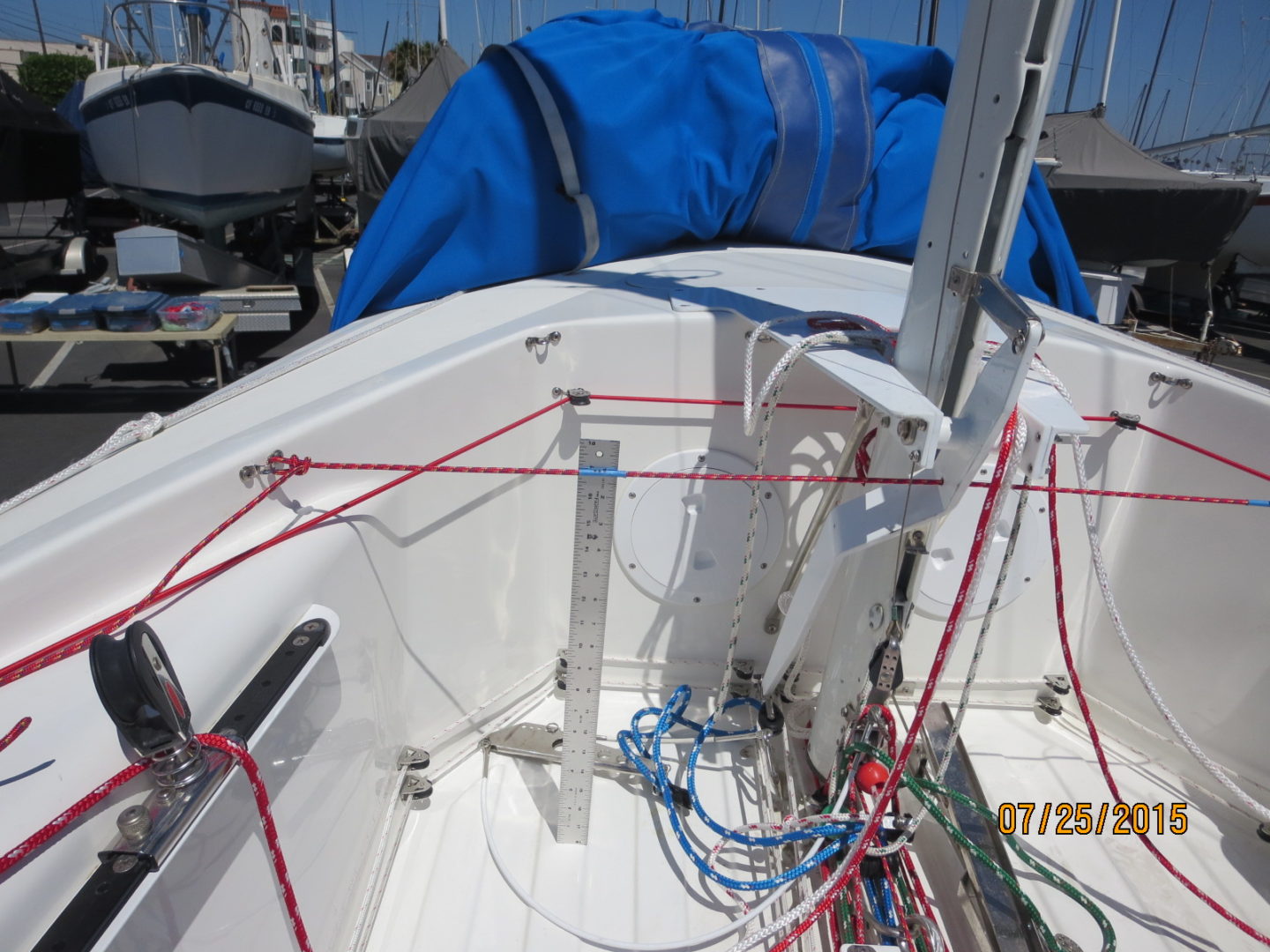 A boat with wires attached to it's hull.