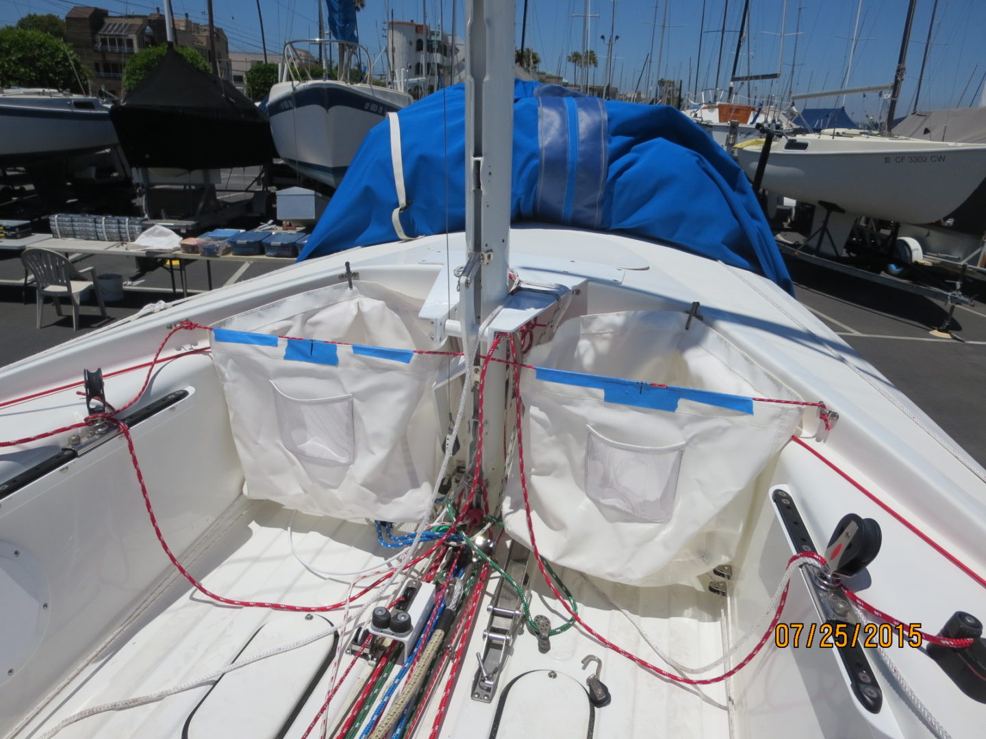 A boat with two bags on the back of it.