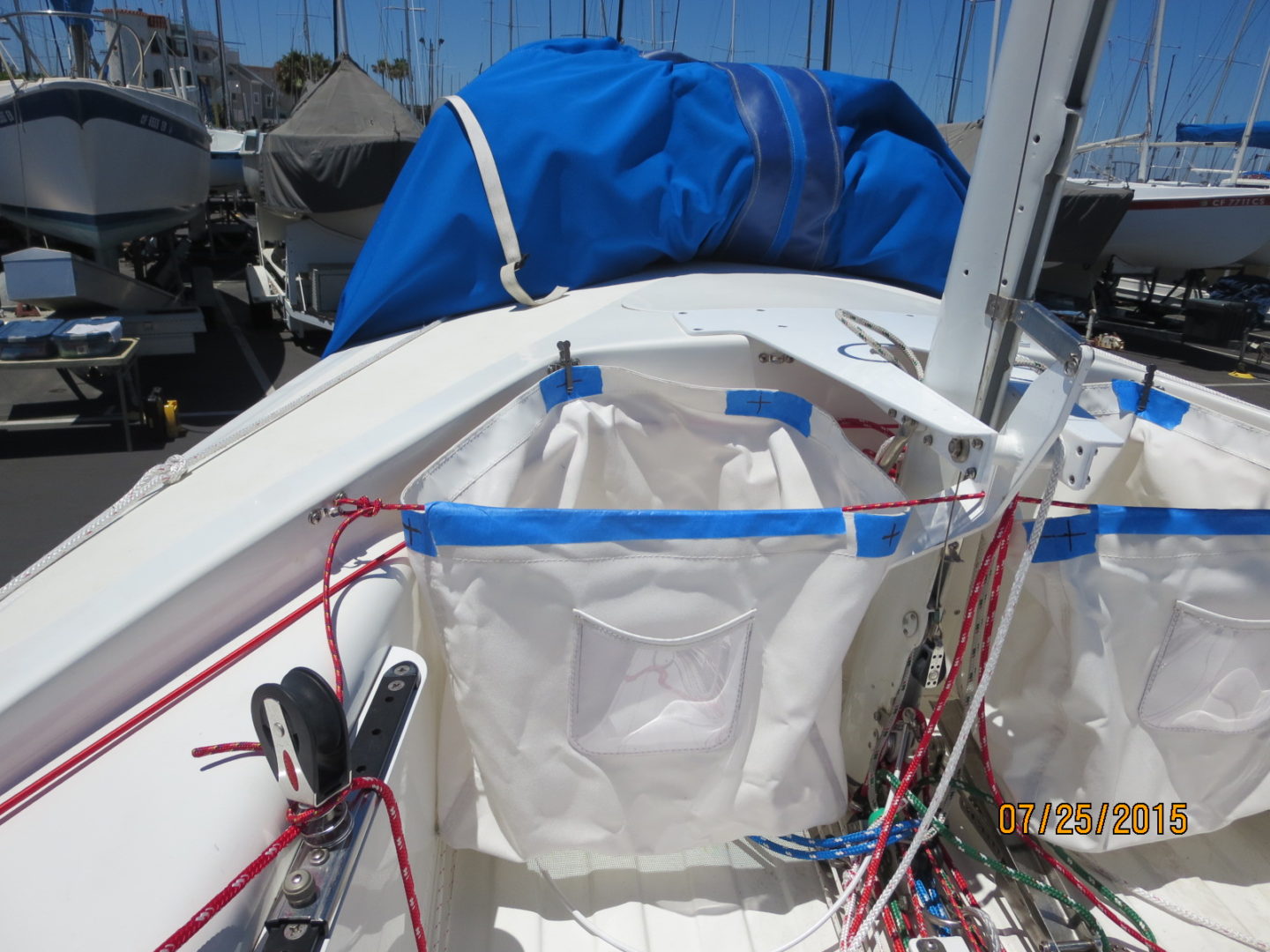 A boat with bags on the back of it.