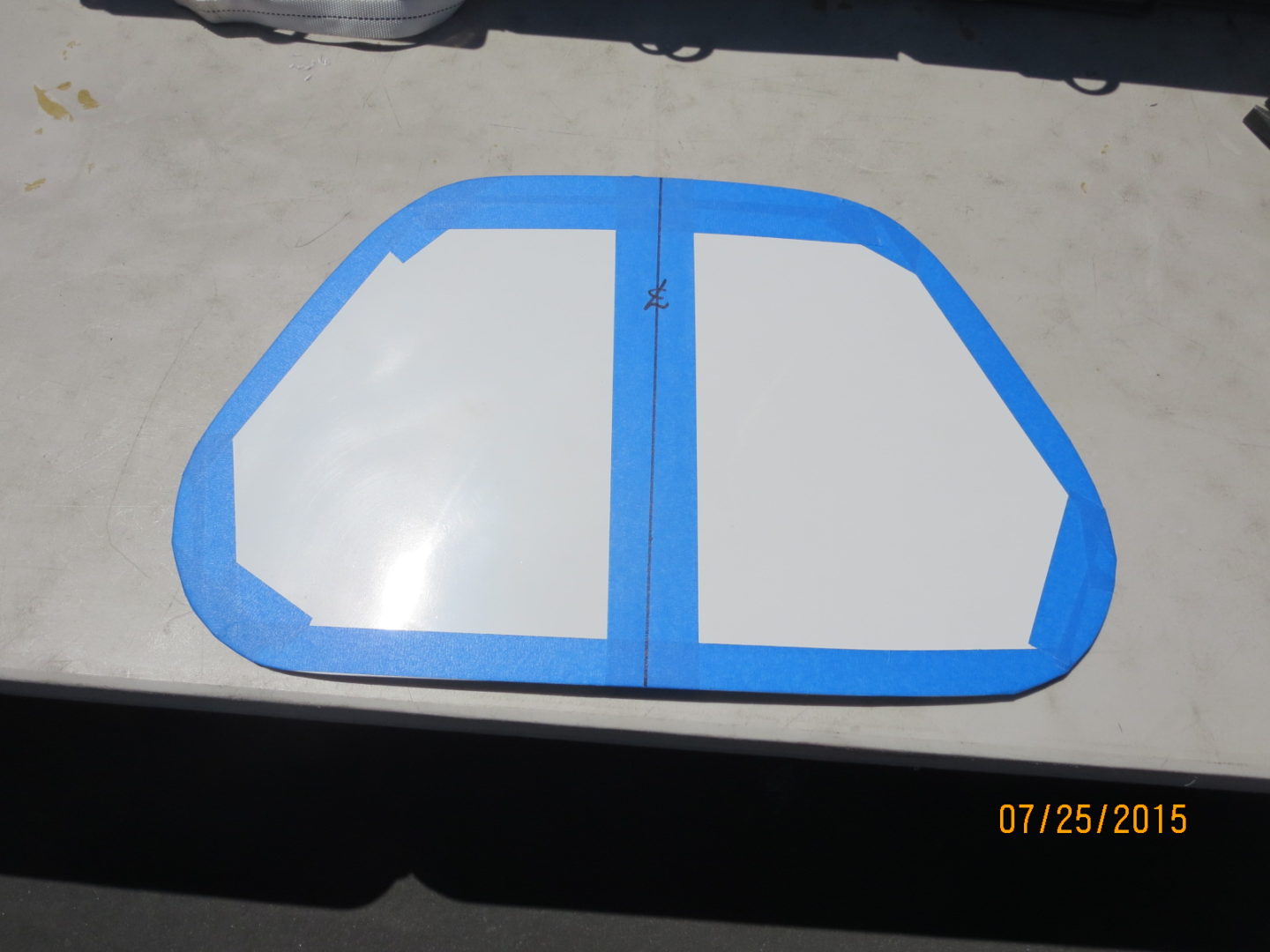 A blue and white sheet of paper on top of a table.