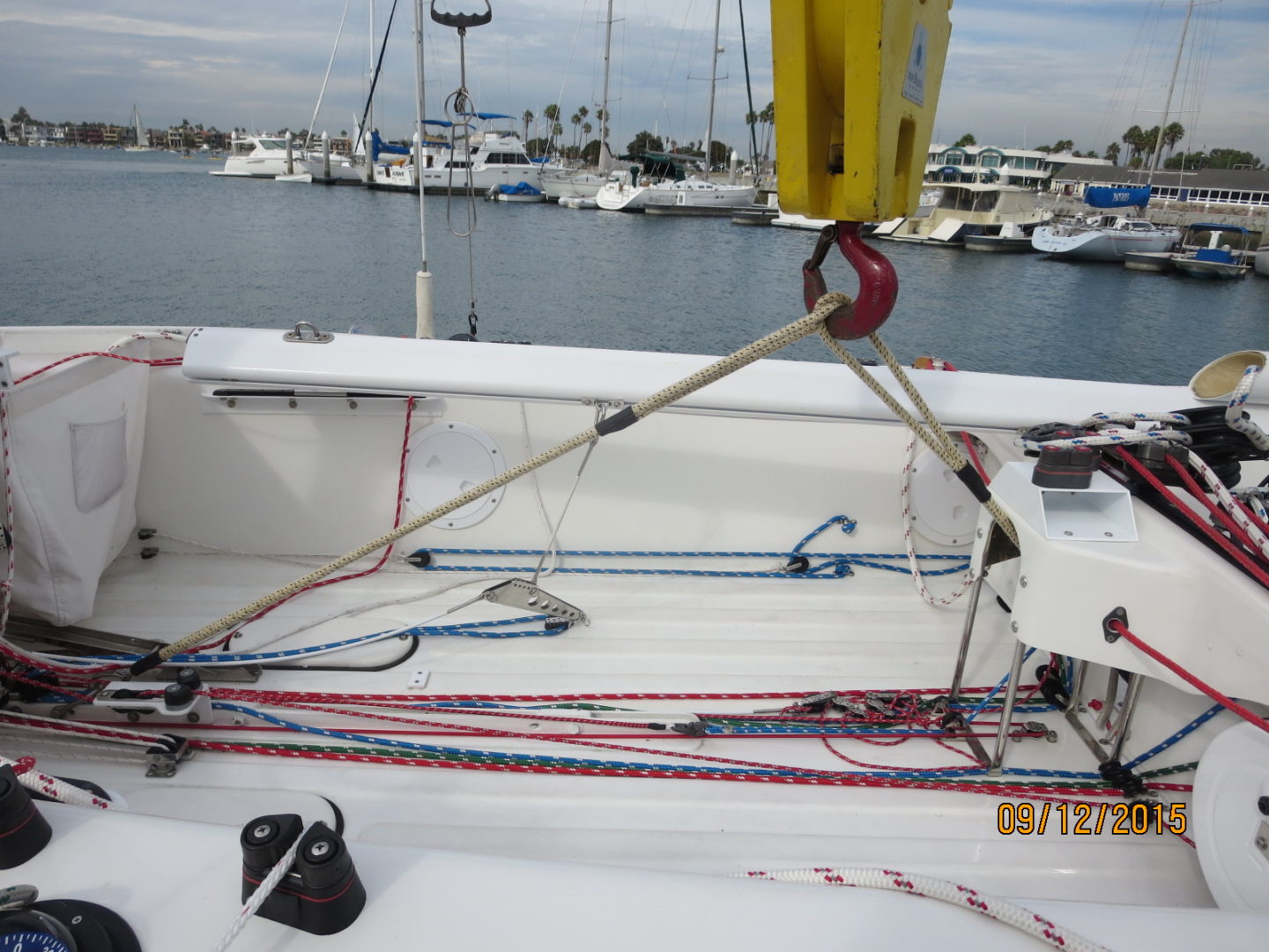 A boat with ropes and a winch on it.