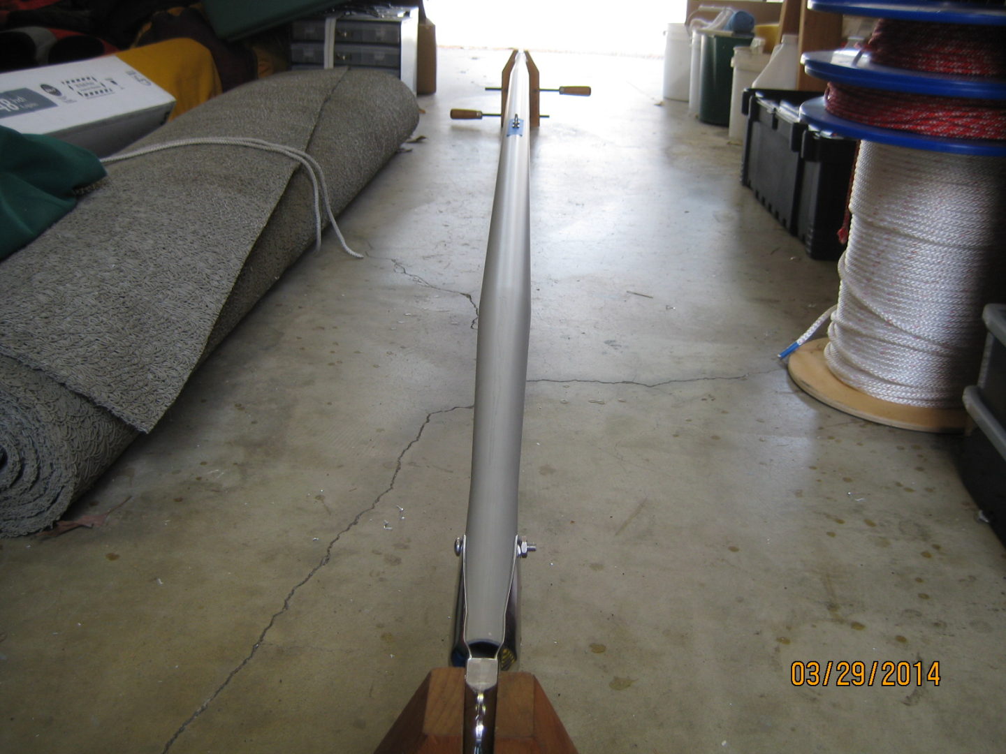 A large metal pole sitting in the middle of a floor.